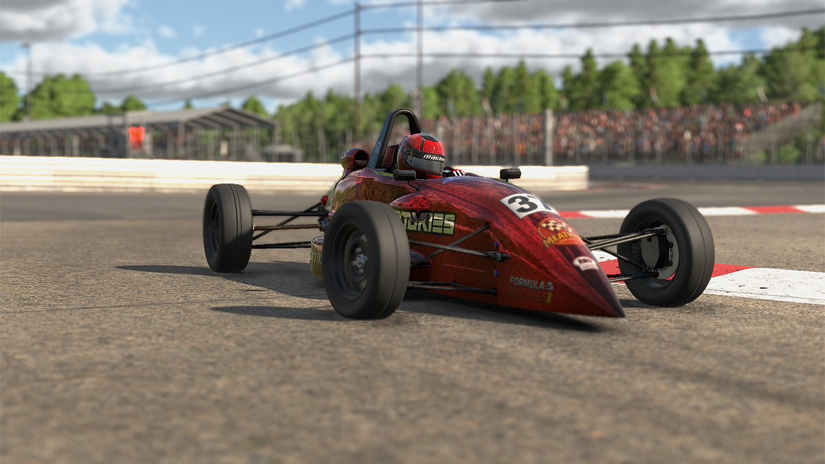 Formula car exiting a corner on track
